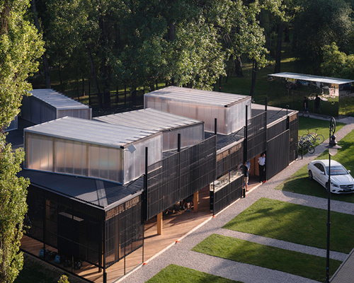 WWAA installs liftable facade to mercedes-benz pavilion in warsaw