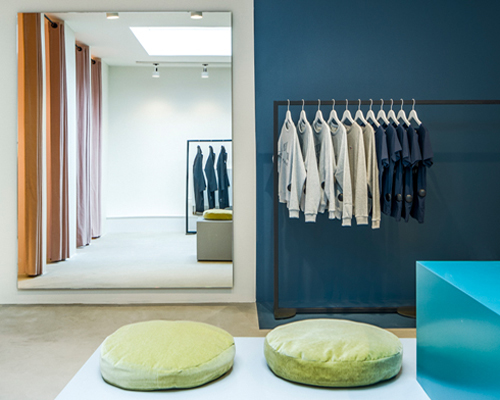 framework studio creates an elegant interior for amsterdam clothing store