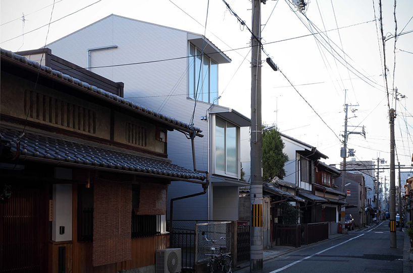 alphaville slots kyoto town house into a narrow residential plot in japan