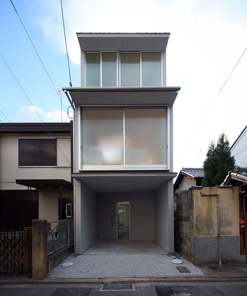 alphaville slots kyoto town house into a narrow residential plot in japan