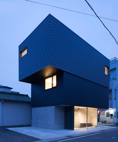APOLLO architects conceals home and art gallery within stacked volumes