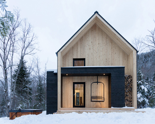 cargo architecture clads villa boreale in quebec with black metal and white cedar
