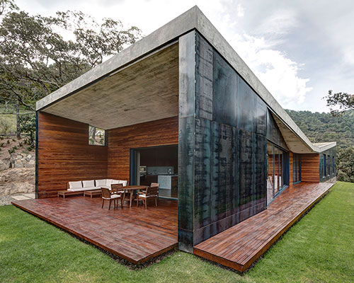 elias rizo arquitectos clads casa gg with polished steel