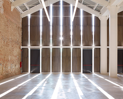 luca cipelletti renovates the historic stables at milan's national science museum