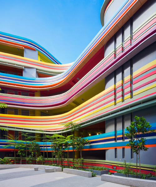 studio505 expands school in singapore with colorful rainbow-like extension