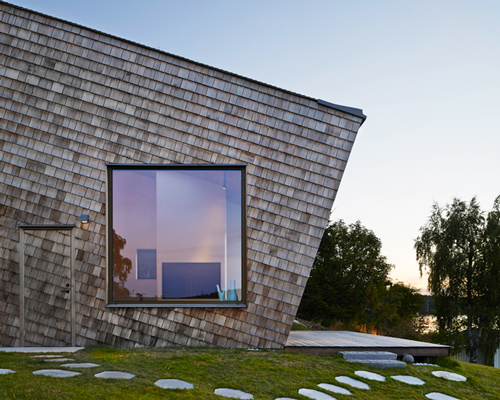 trigueiros architecture clads swedish dwelling entirely in timber shingles