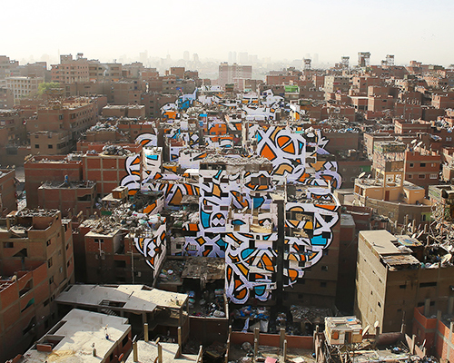 eL Seed challenges cultural perceptions with city-scale anamorphic art in cairo