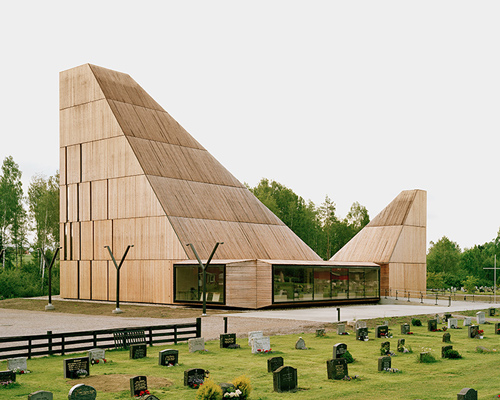 espen surnevik resurrects new våler church in norway with dual timber towers