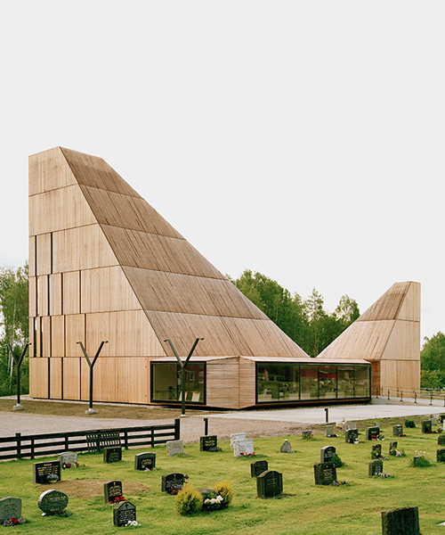 espen surnevik resurrects new våler church in norway with dual timber towers