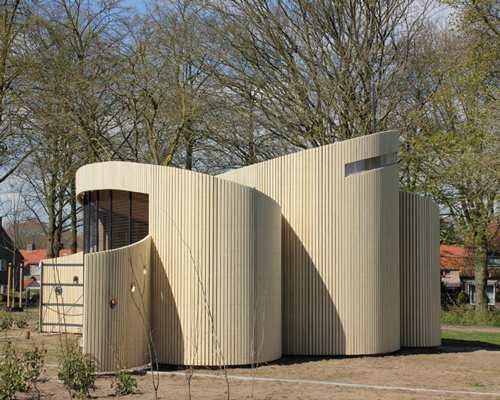 frank marcus assembles cylindrical beekeeping pavilion in the netherlands