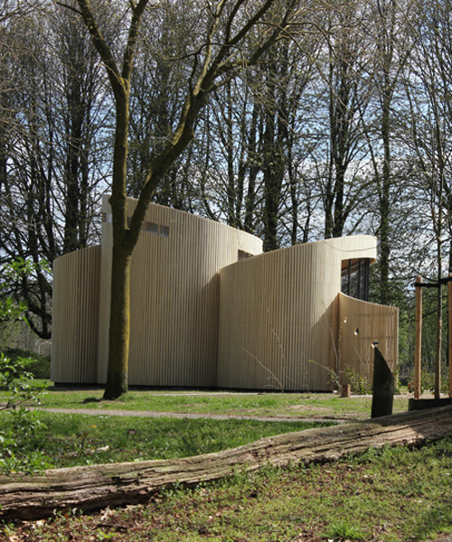 frank marcus assembles cylindrical beekeeping pavilion in the netherlands