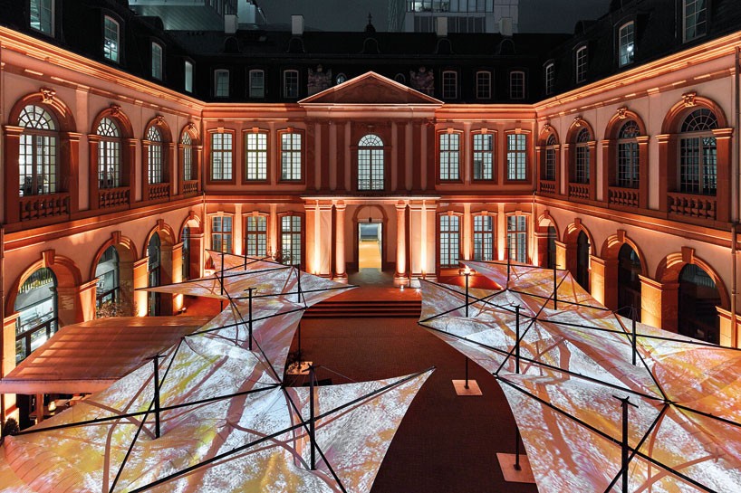 grimshaw + MDT-tex installs series of tessellated canopies in frankfurt courtyard