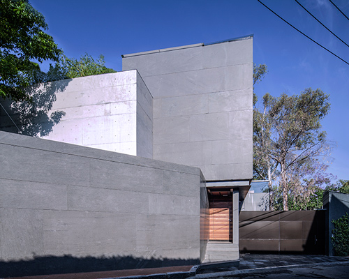 grupo arquitectura hides casa basaltica in mexico city behind fortress-like façade