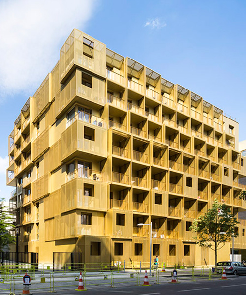 hamonic + masson extrudes cubes from golden student housing complex near paris