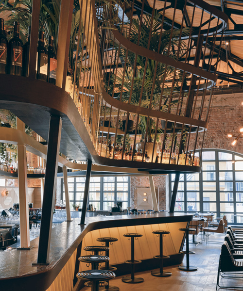 autoban sets kilimanjaro restaurant within warehouse in istanbul