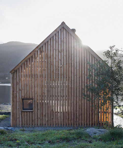 kolab and koreo architects revitalizes timber boathouse in norway