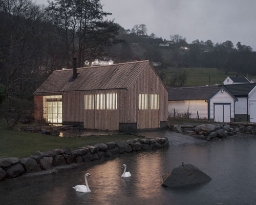 kolab and koreo architects revitalizes timber boathouse in norway