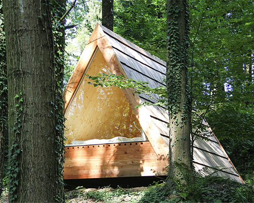 lushna builds triangular cabins to experience nature in slovenia