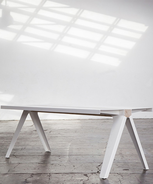 marco de masi designs volta, a table in steel and wood for officine tamborrino