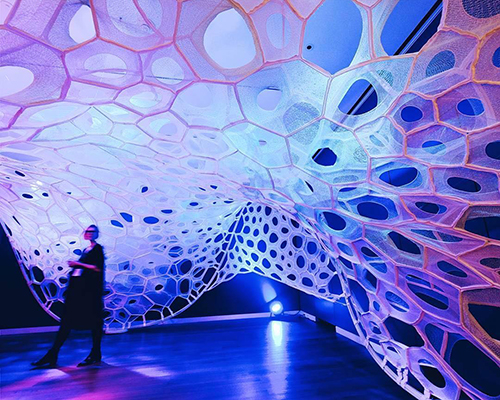 jenny sabin installs light-absorbing knitted textile pavilion at cooper hewitt