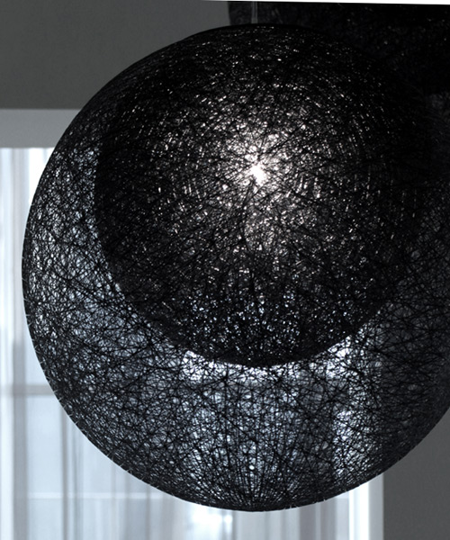toyo ito's mayuhana ma black lamps for yamagiwa are hand made cocoons of spun thread
