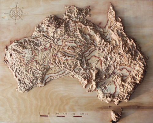 geologist cuts 3D maps in wood using satellite data