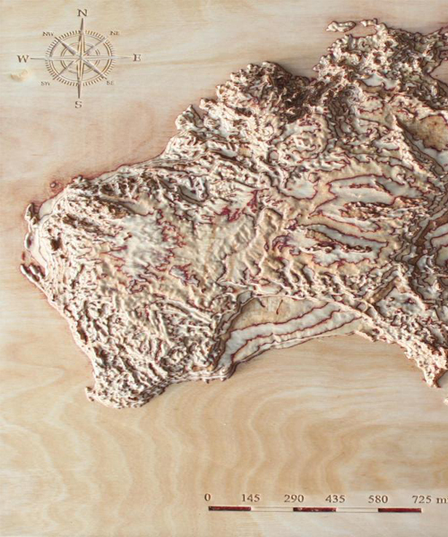 geologist cuts 3D maps in wood using satellite data