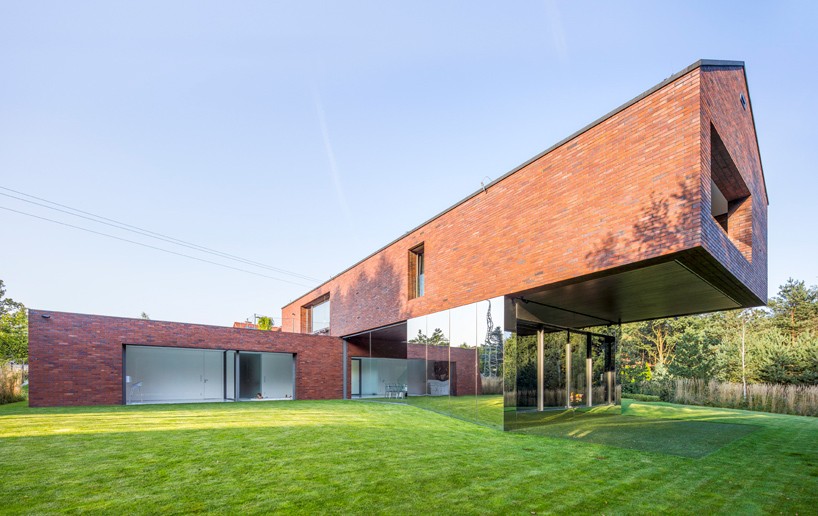 KWK promes blends living and nature with garden house in poland