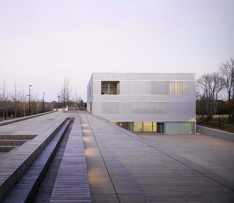 LAN architecture wraps contemporary town hall in france with double façade
