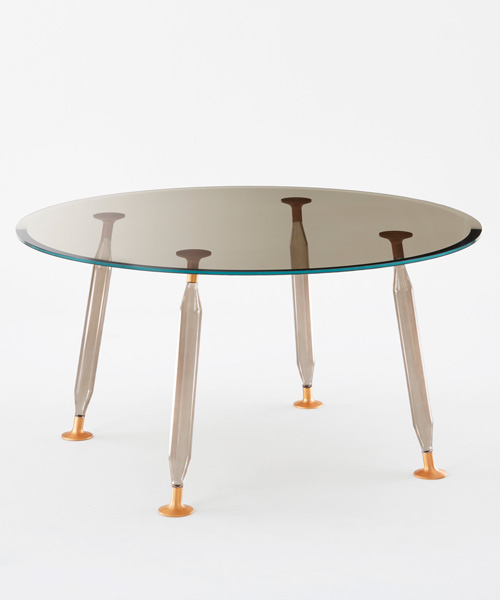 philippe starck's lady hio colored dining tables for glas italia
