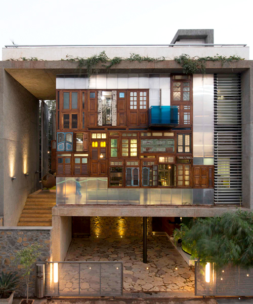 S+PSARCHITECTS adds recycled doors and windows to mumbai house façade