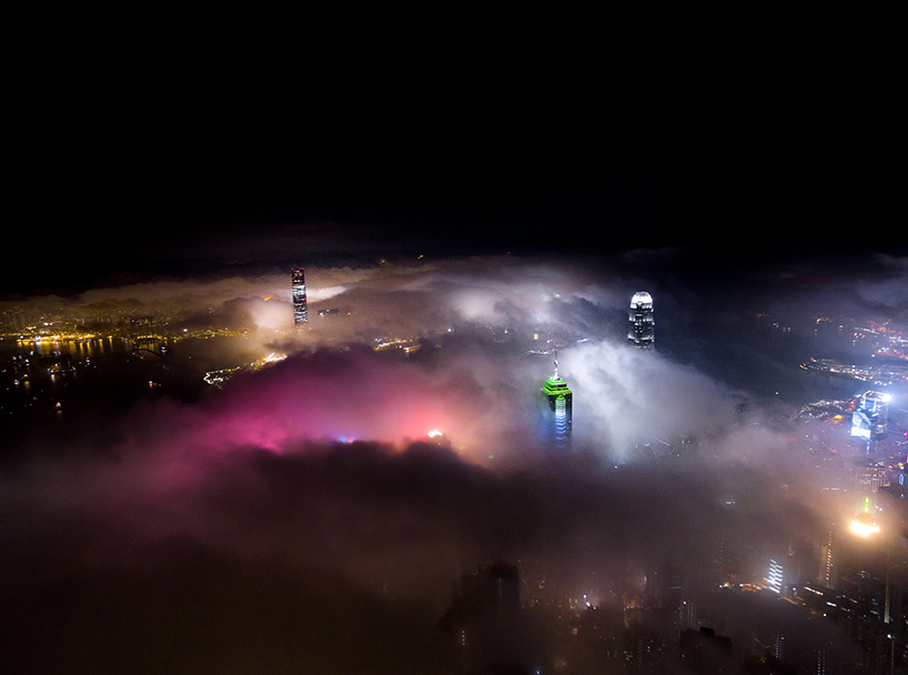 andy yeung's drone photos rise above hong kong at night to capture urban fog