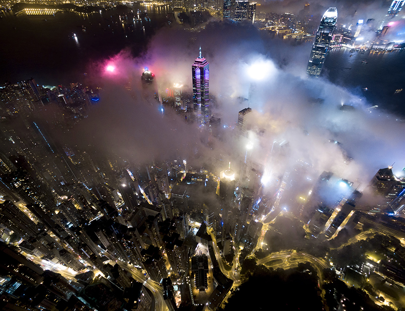 andy yeung's drone photos rise above hong kong at night to capture urban fog