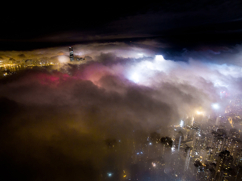 andy yeung's drone photos rise above hong kong at night to capture urban fog