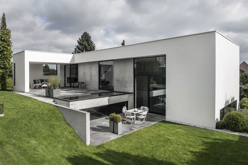 ardess plans L-shaped contemporary villa in denmark