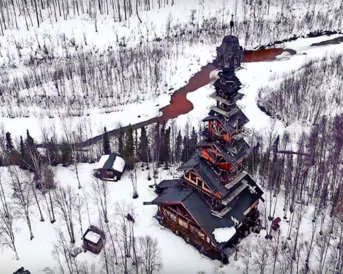 alaskan attorney builds 185 foot stacked log cabin tower in the wilderness