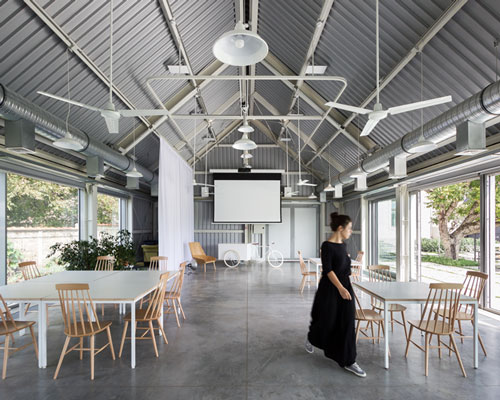 autori references local sheds to create light-filled events space in serbia