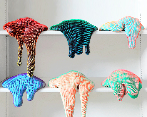 dan lam's drippy sculptures ooze a curvaceous anatomy of spikey neon matter