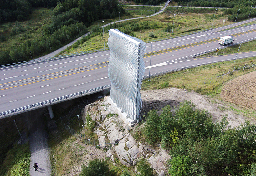handegård arkitektur realizes reflective roadside landmark in norway