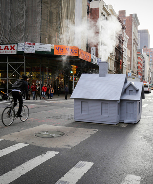 mark reigelman's puts miniature cabin on top of steaming manhole covers for smökers installation