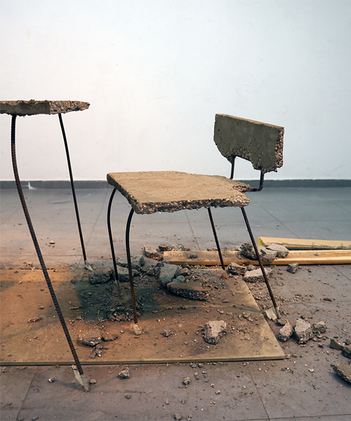 iftach gazit casts table and chair collection from a single slab of concrete