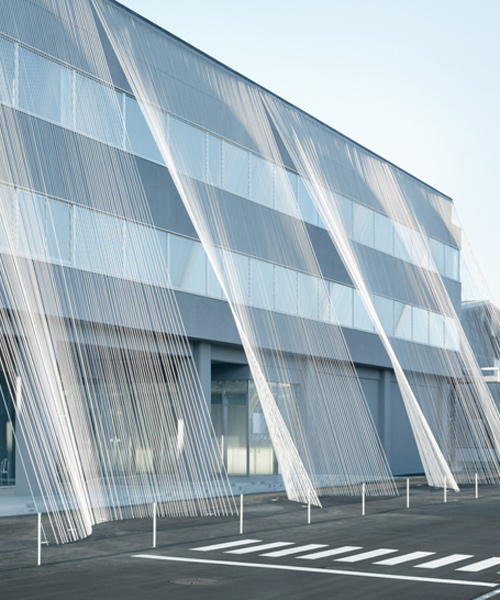 kengo kuma protects japanese office building with carbon fiber curtain