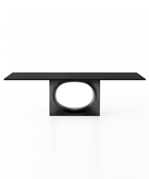 kensaku oshiro's hole table for kristalia features a large oval cut-out