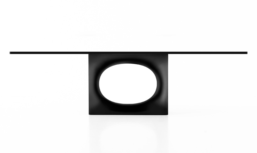 kensaku oshiro's hole table for kristalia features a large oval cut-out