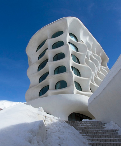 RYRA studio sculpts iranian ski resort to blend into its snow-capped mountain landscape