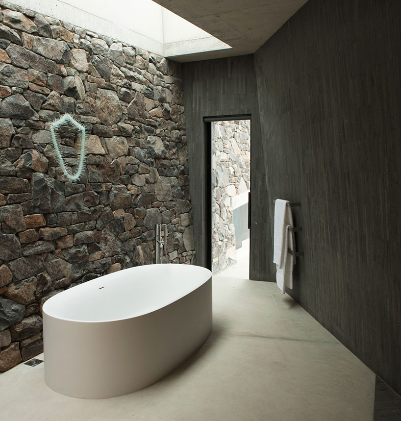 pattersons builds remote seascape retreat on volcanic mountainside