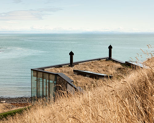 pattersons builds remote seascape retreat on volcanic mountainside
