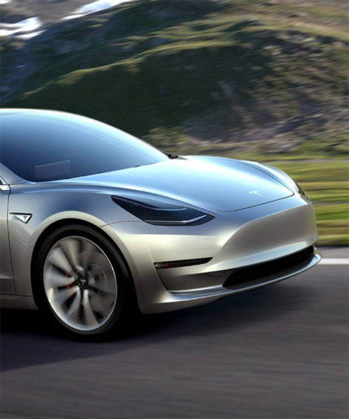 elon musk debuts tesla's model 3 with a range of 346 km on a single charge
