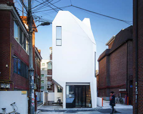 theplus architects defines seoul publisher's office with faceted white façade