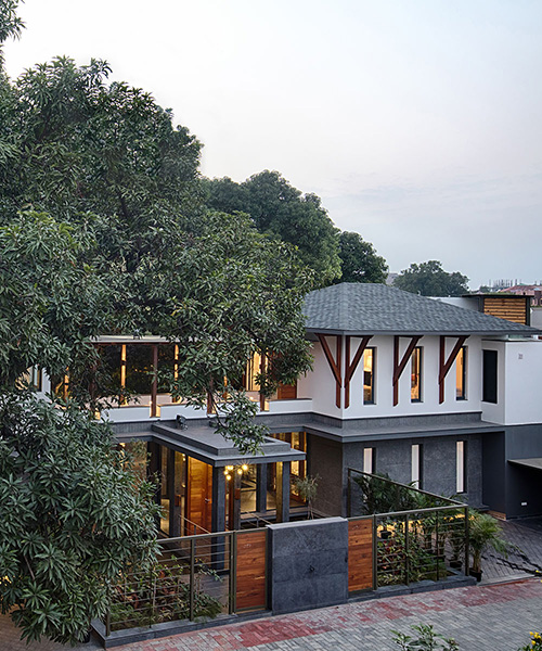 ujjval panchal & kinny soni design mango tree house in india